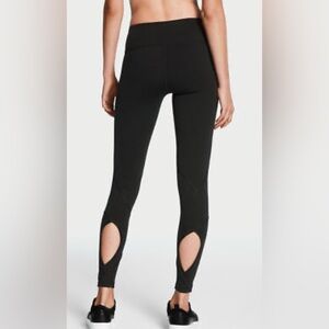Victoria Secret black knockout leggings with cut outs on back of legs